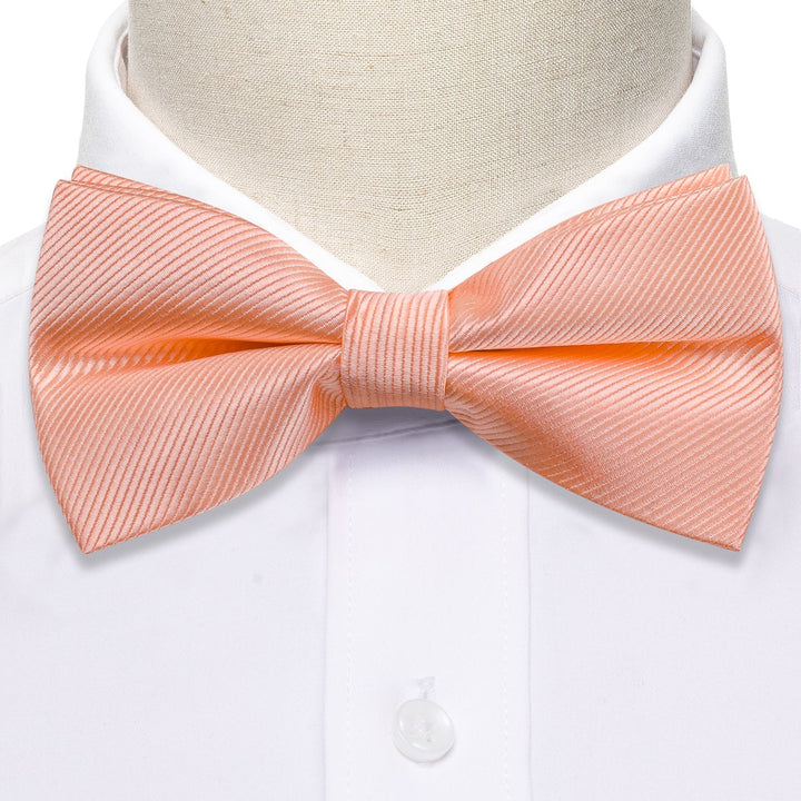 light orange bow tie