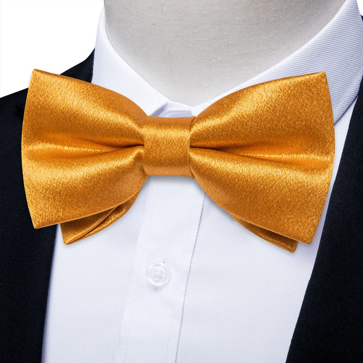 gold bow tie