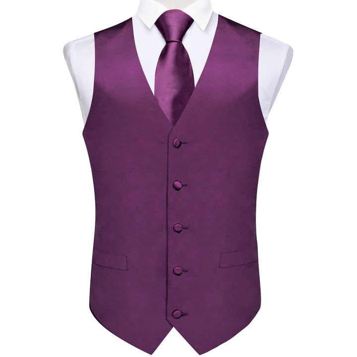 purple vest and tie