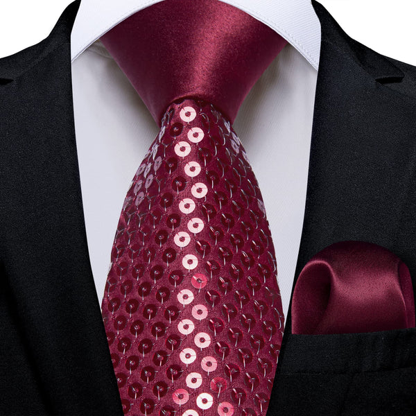 black suit burgundy tie