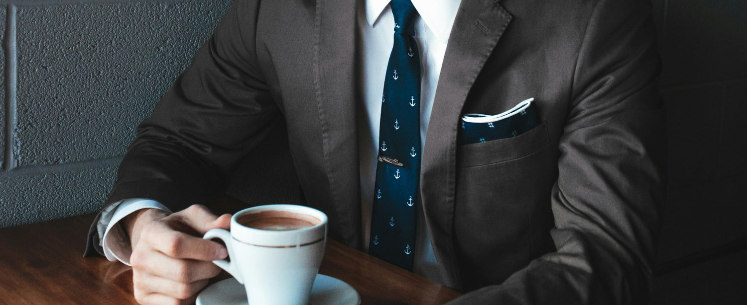 Fashion business man blue tie brown jacket